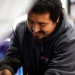 Mid-Valley Auto Body & Service Center Mechanic working underneath the hood of car